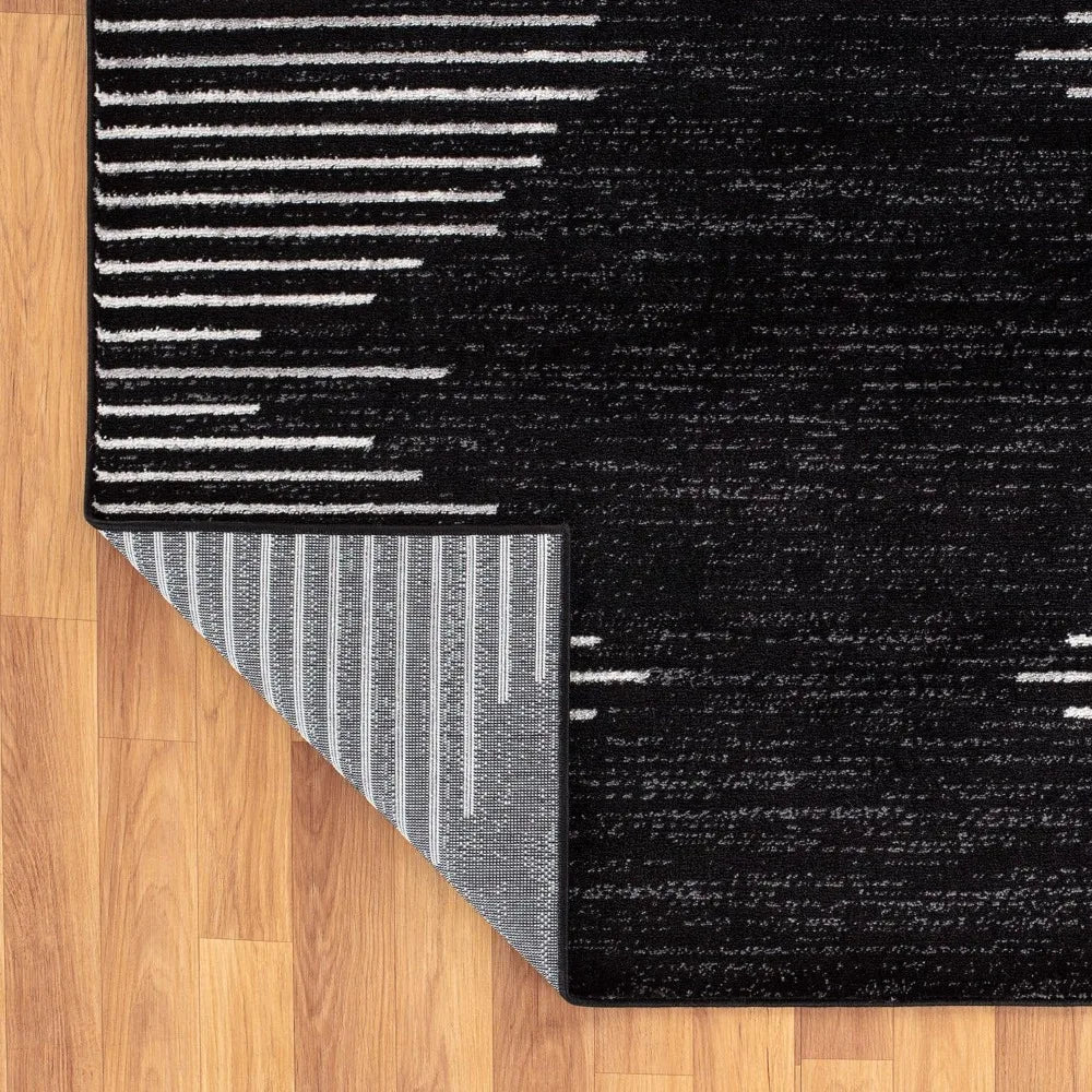 6'6" x 9' Black Stripe Stain Resistant High Traffic Area Rug