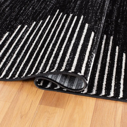 6'6" x 9' Black Stripe Stain Resistant High Traffic Area Rug